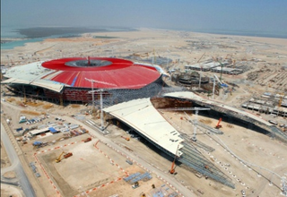 Illustration for article titled Time-Lapse Gallery Of Abu Dhabi's Nearly-Completed Ferrari World Theme Park